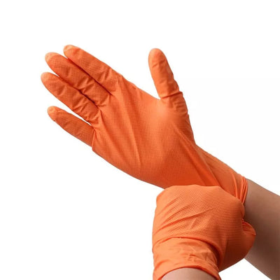 Edma Pro Defender Orange Nitrile Diamond Grip 9mil Gloves on hand #color_orange