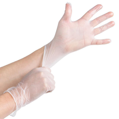 White Protect X disposable vinyl gloves on hand stretched #color_white