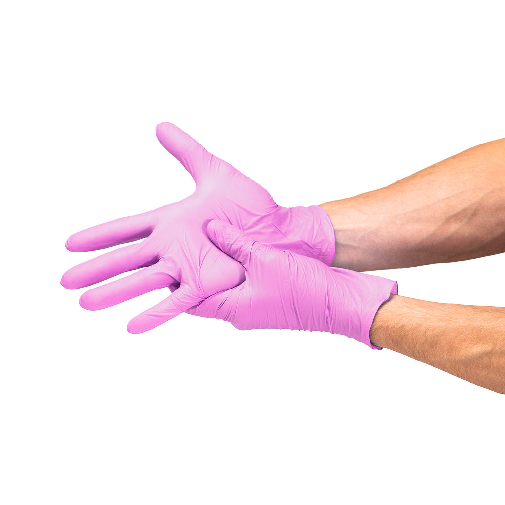 Safe Plus Pink Nitrile Examination Gloves on hand #color_pink